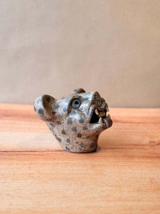 Jaguar flauta orejón barro pulido