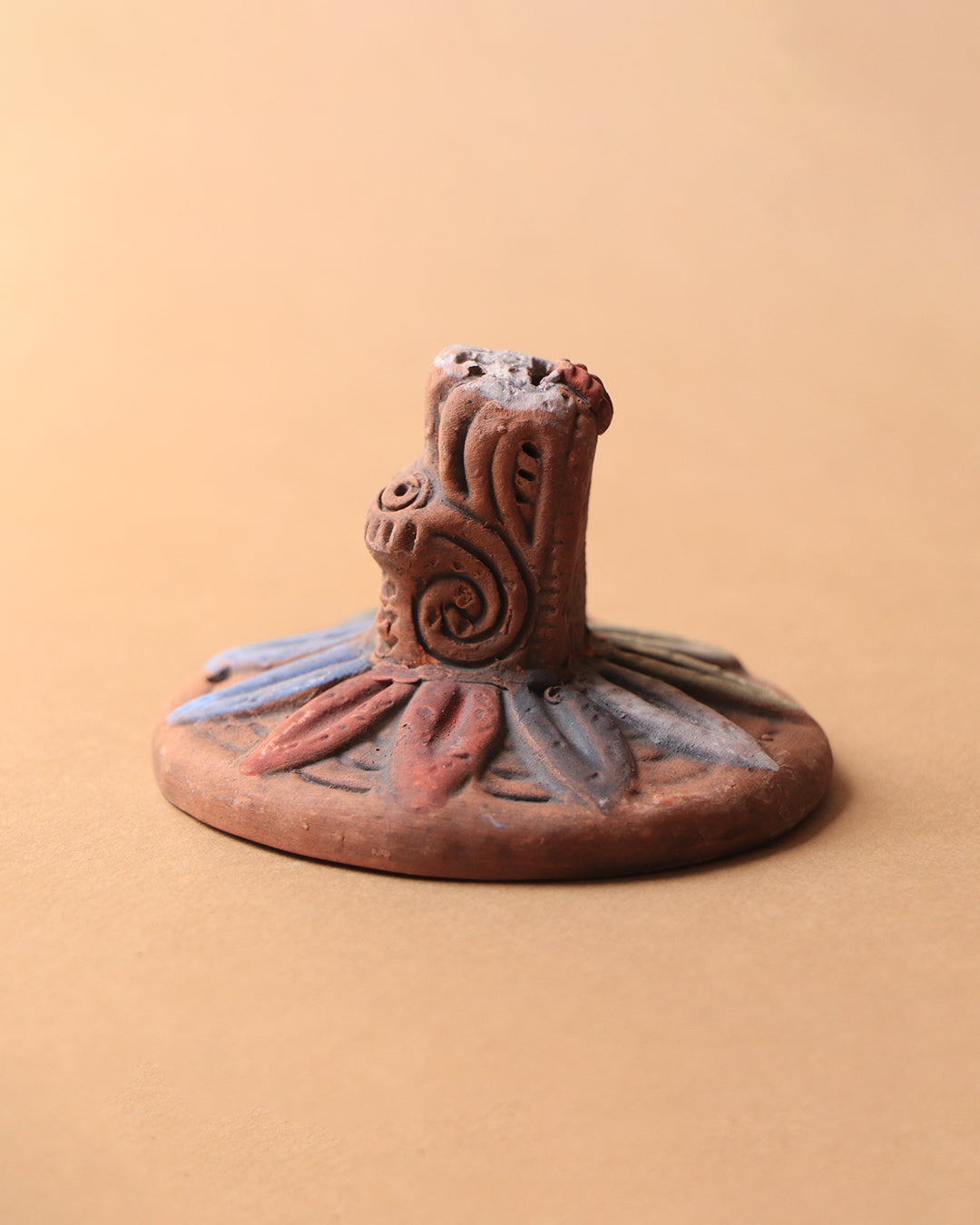 Cabeza Quetzalcoatl de barro rústico micro