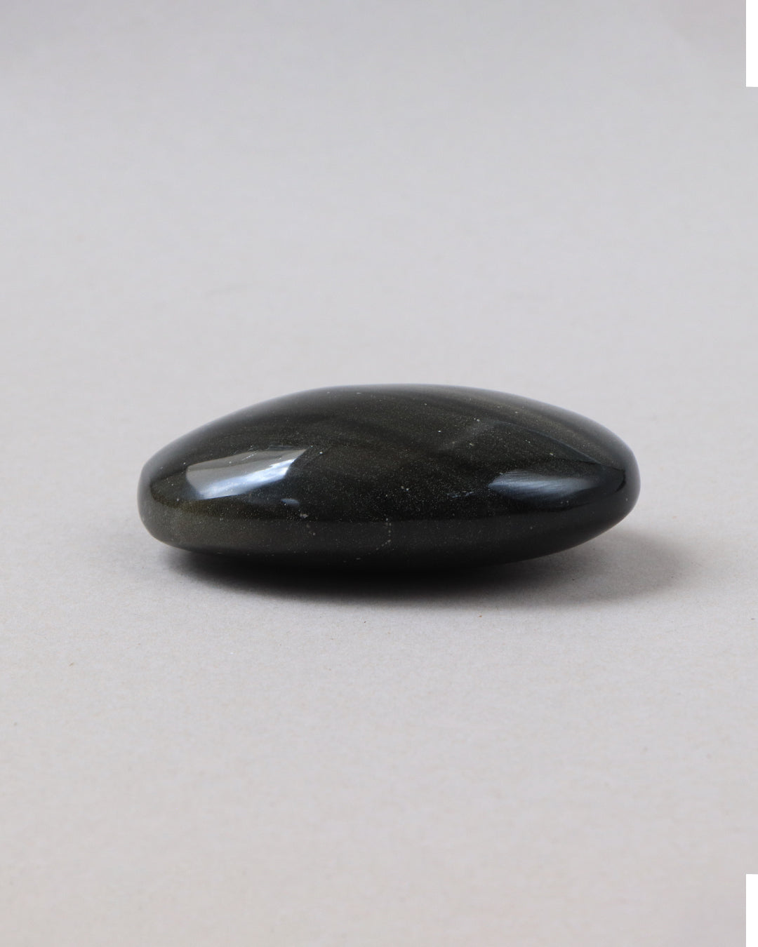 Masajeador de obsidiana jabon