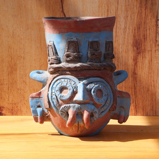 Vasija con máscara de Tláloc