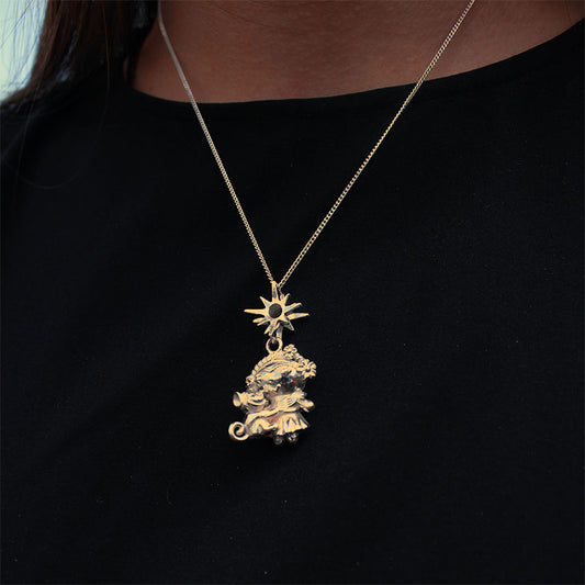 charm frida y mono dorado