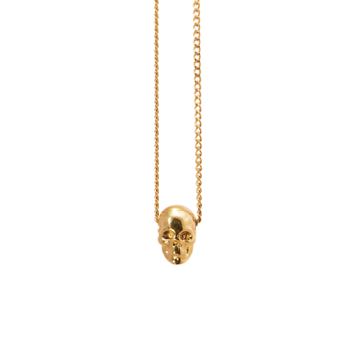 dije cráneo mini chapa de oro