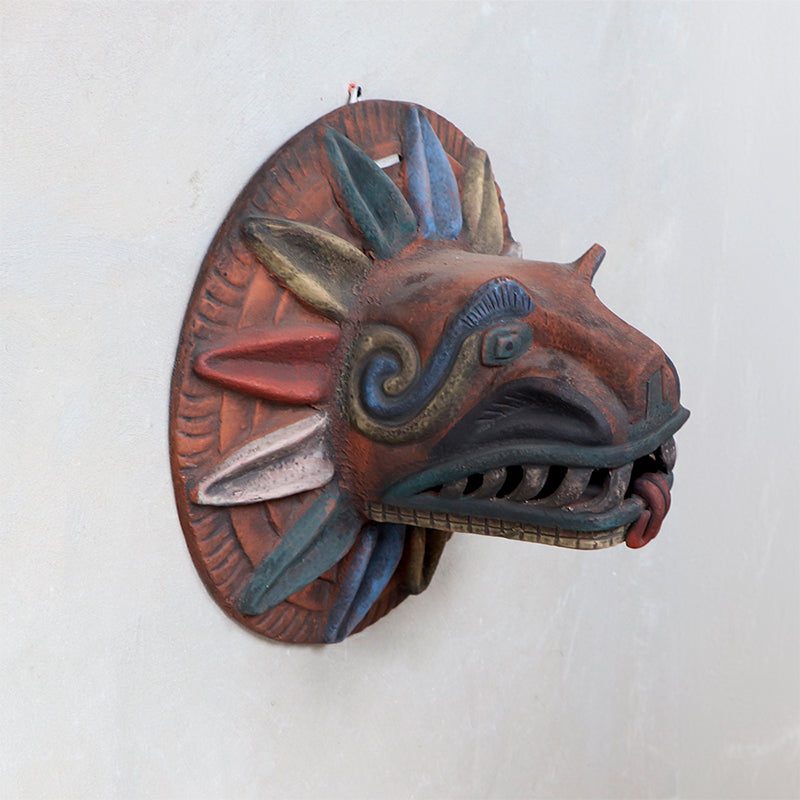 cabeza Quetzalcóatl de barro rústico g