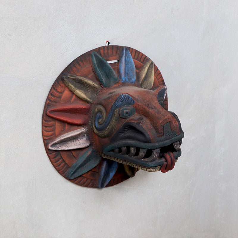 cabeza Quetzalcóatl de barro rústico g