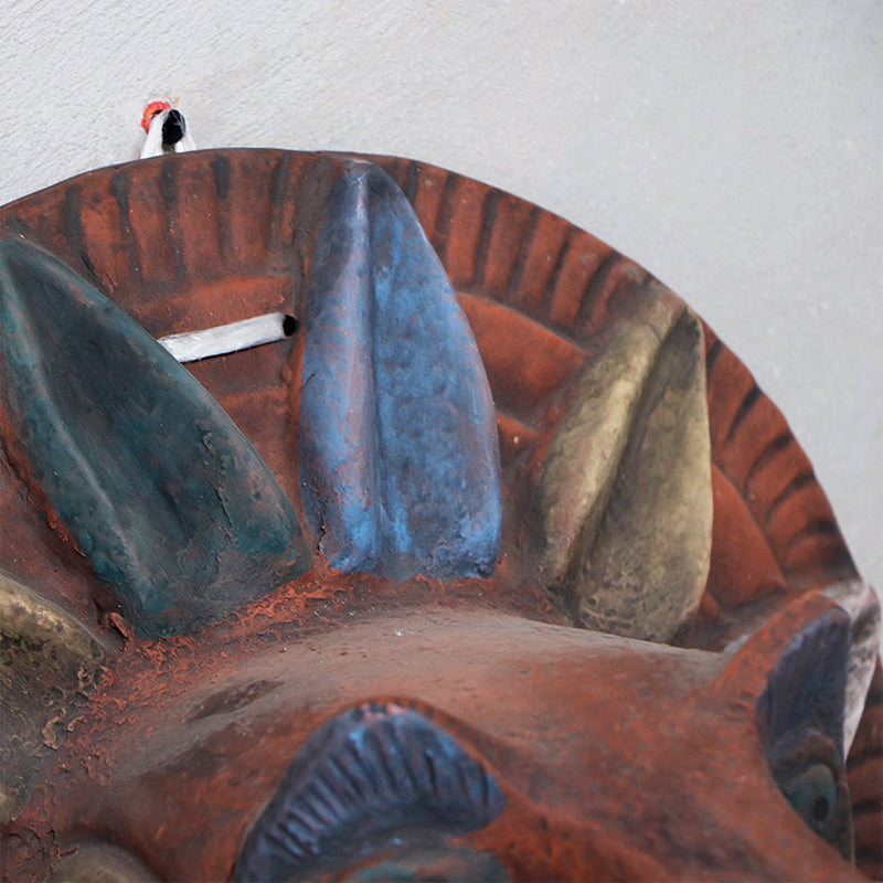 cabeza Quetzalcóatl de barro rústico g