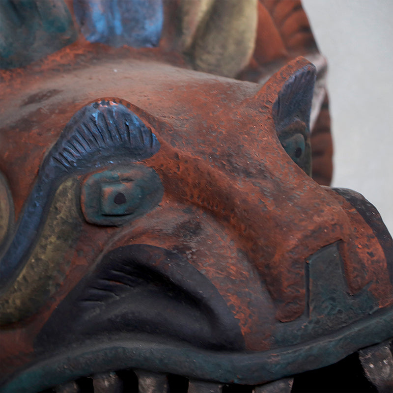cabeza Quetzalcóatl de barro rústico g