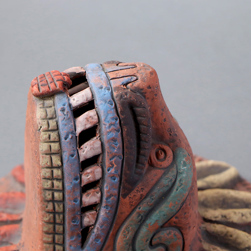 cabeza Quetzalcóatl de barro rústico m