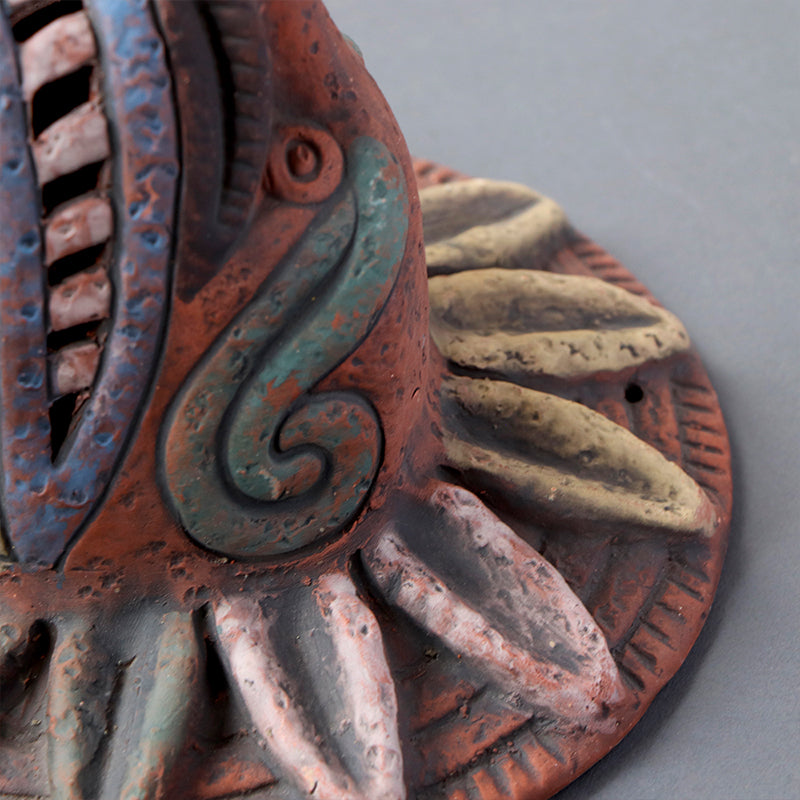 cabeza Quetzalcóatl de barro rústico m