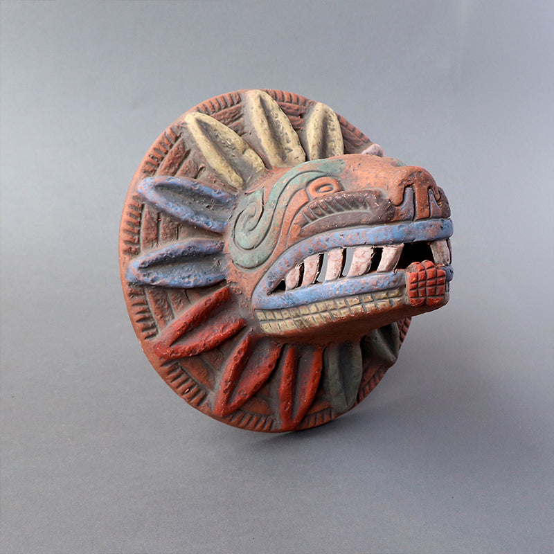 cabeza Quetzalcóatl de barro rústico m