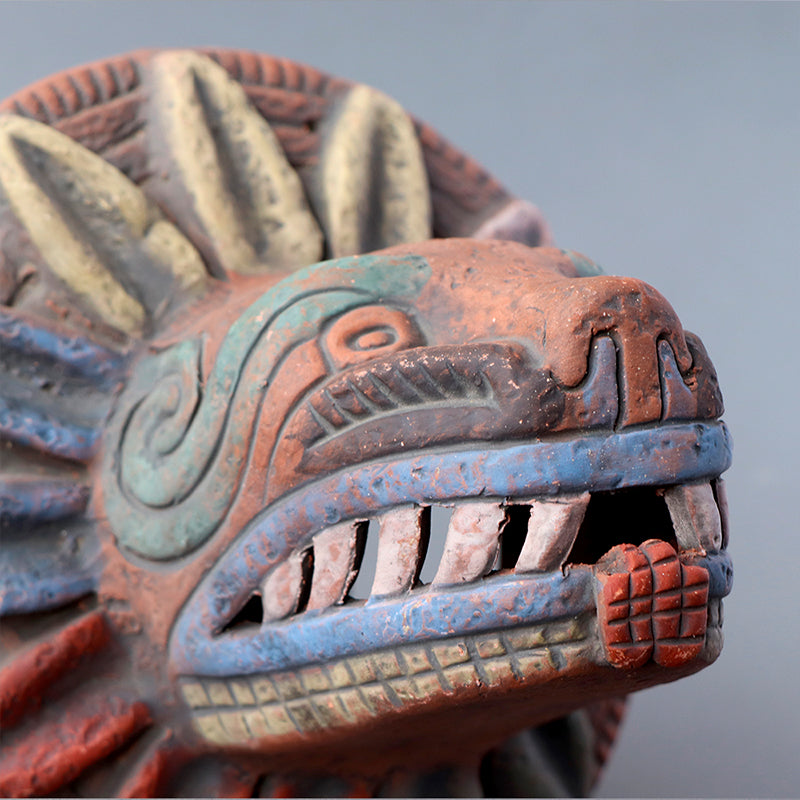 cabeza Quetzalcóatl de barro rústico m
