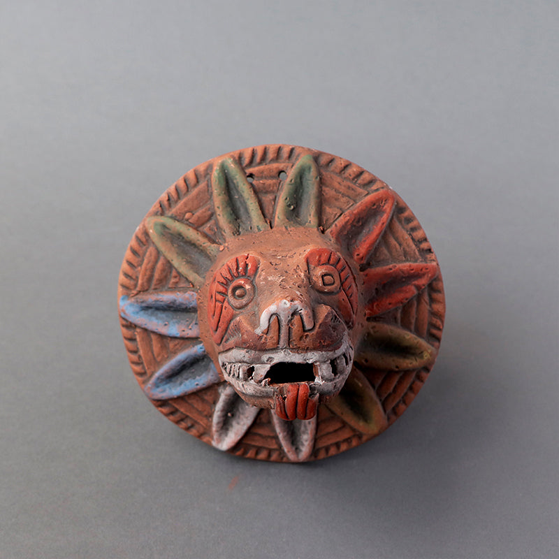 cabeza Quetzalcóatl de barro rústico ch