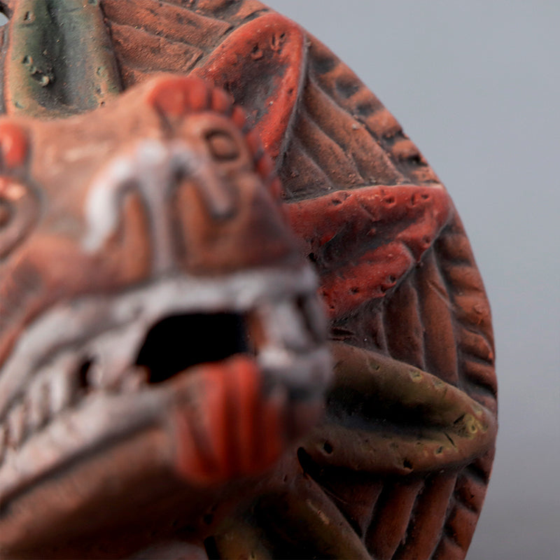 cabeza Quetzalcóatl de barro rústico ch