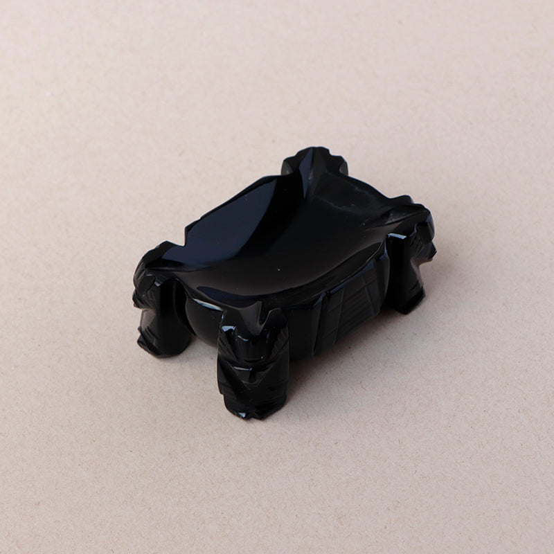 cenicero de obsidiana con ídolos