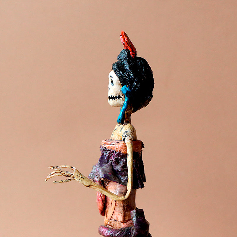 catrina con aretes