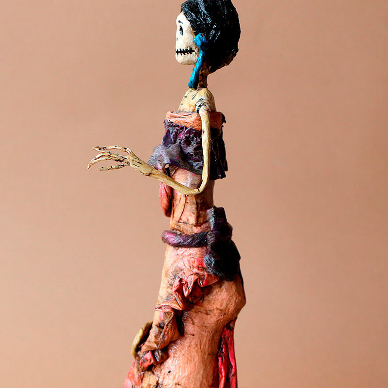 catrina con aretes