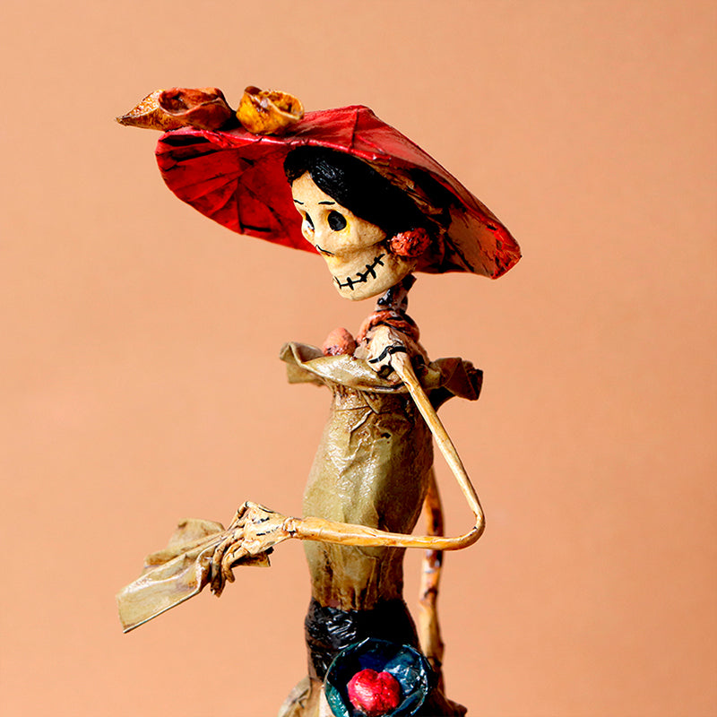 catrina con abanico y sombrero