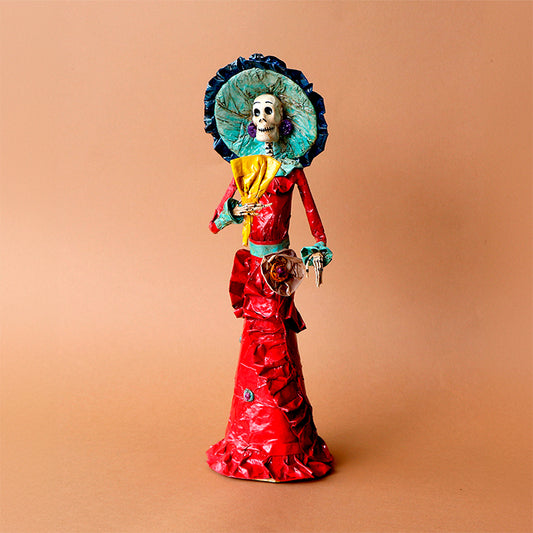 catrina con abanico amarillo