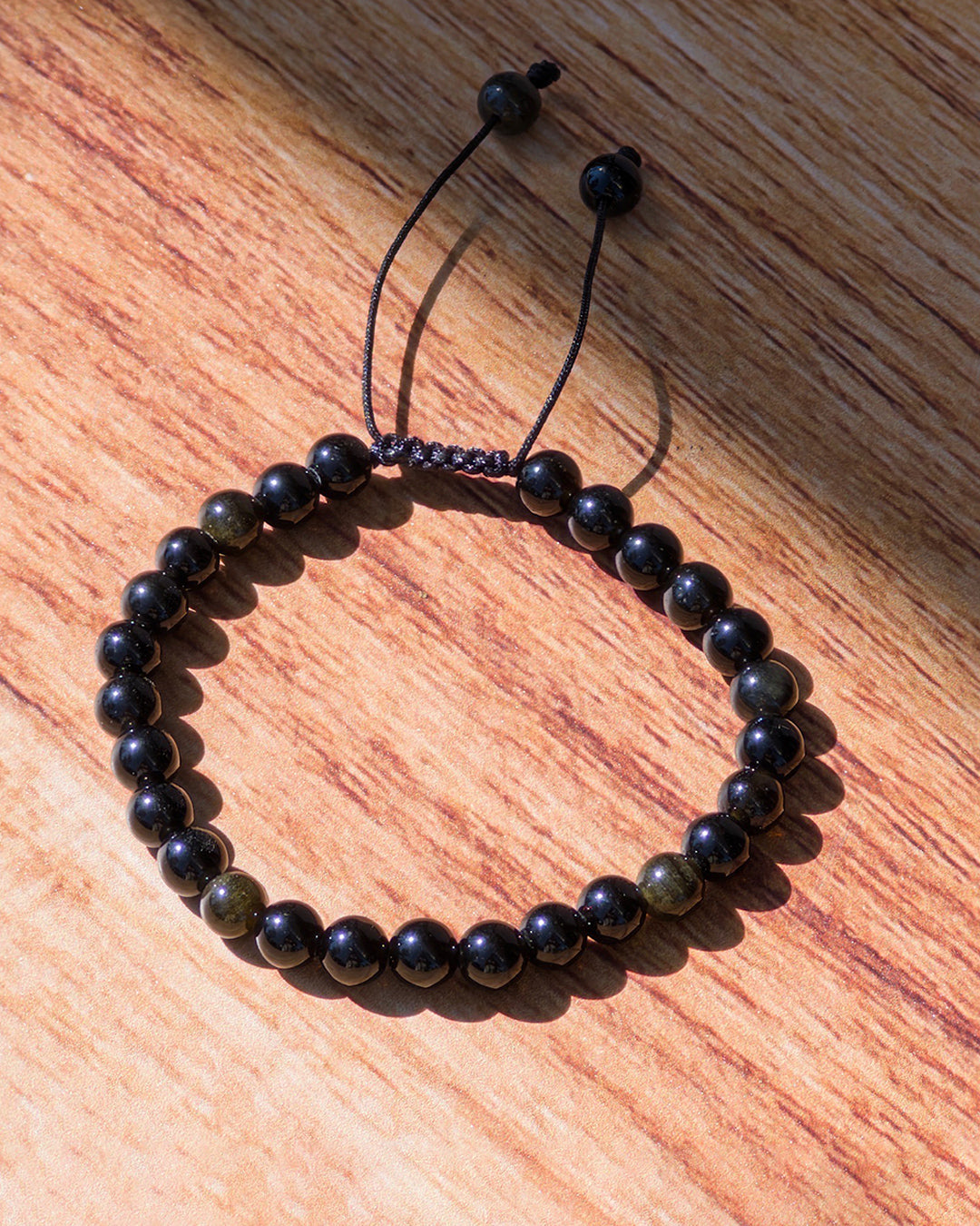 Pulsera ajustable obsidiana dorada 4mm