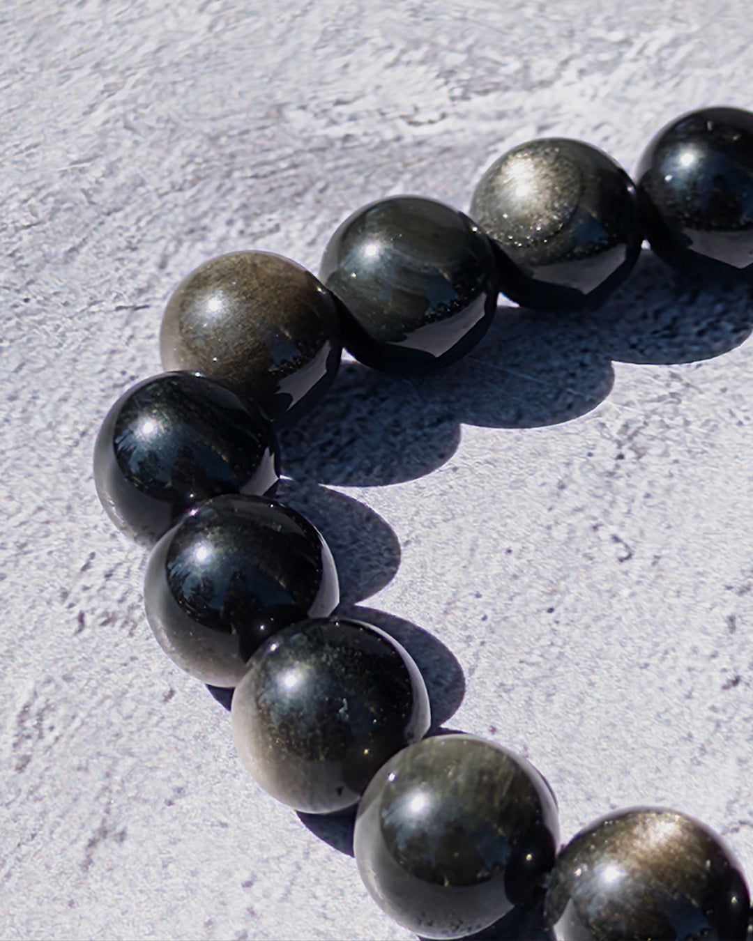 Pulsera obsidiana dorada 14mm