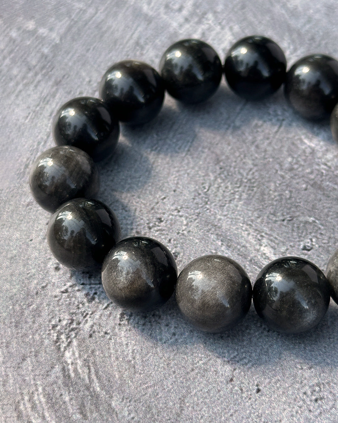 Pulsera obsidiana plateada 14mm