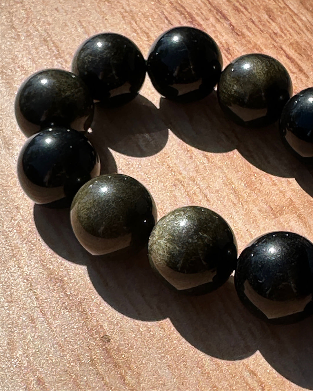 Pulsera obsidiana dorada 16mm