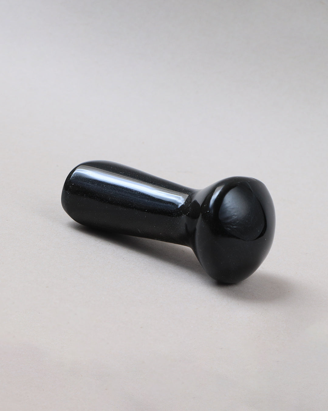 Masajeador de obsidiana