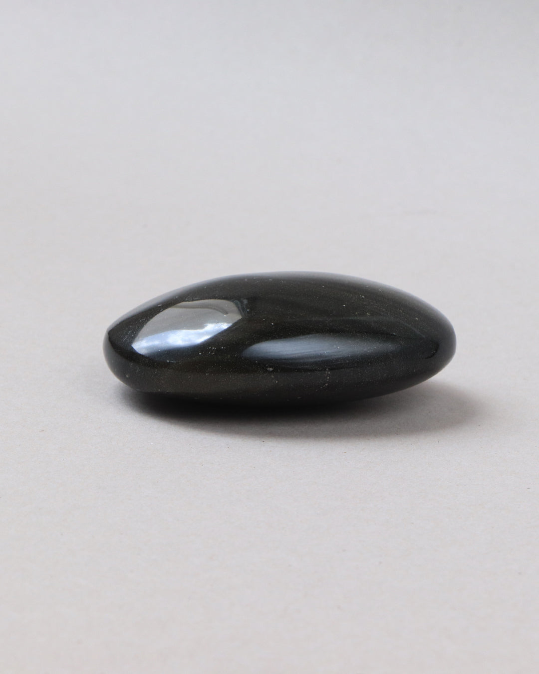 Masajeador de obsidiana