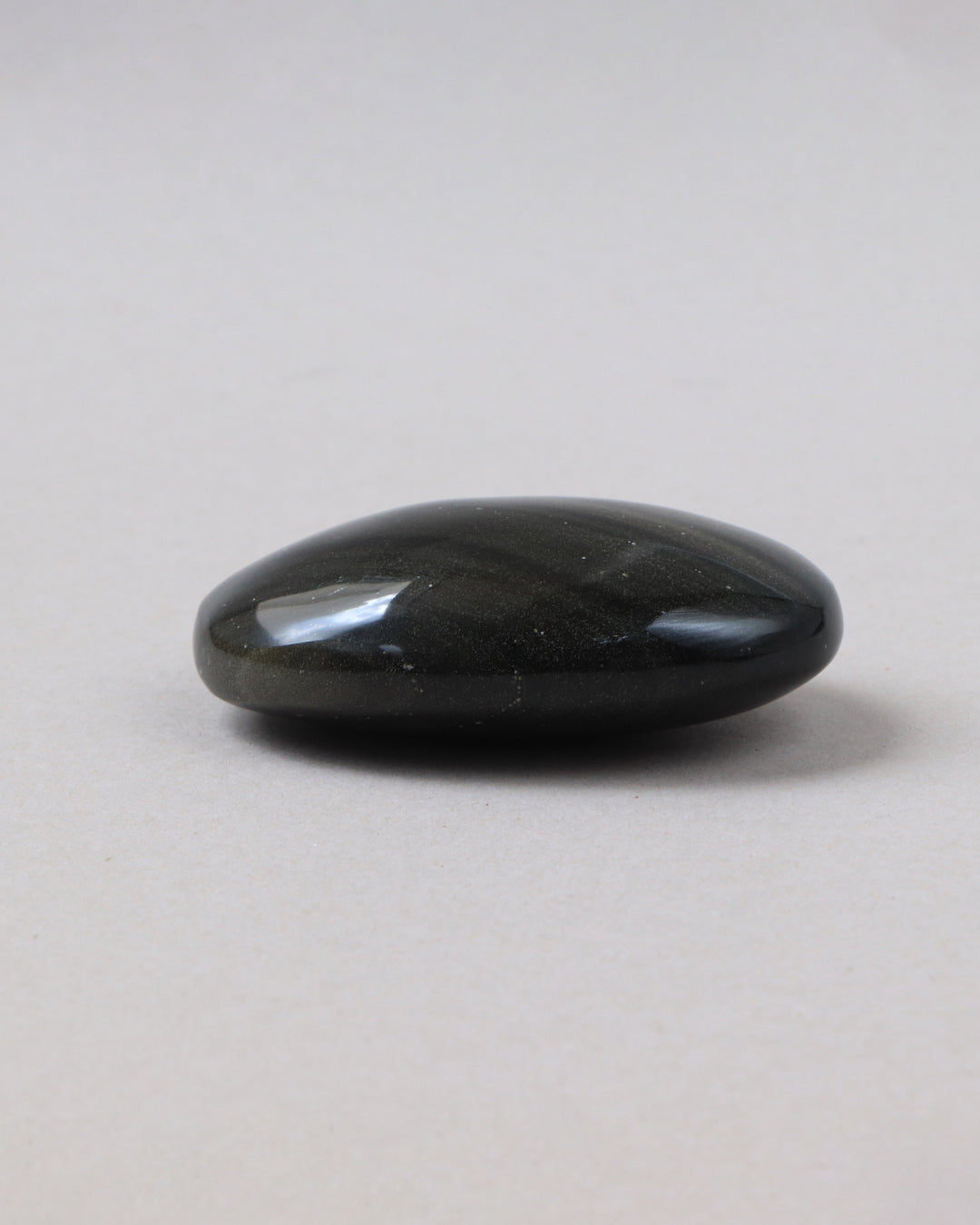 Masajeador de obsidiana