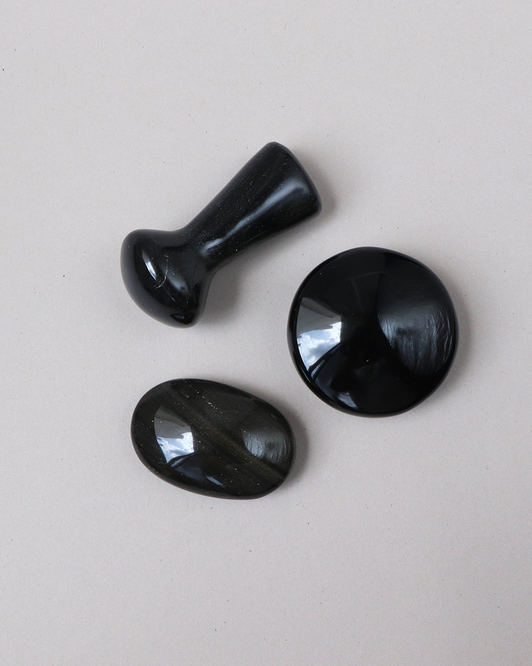Masajeador de obsidiana