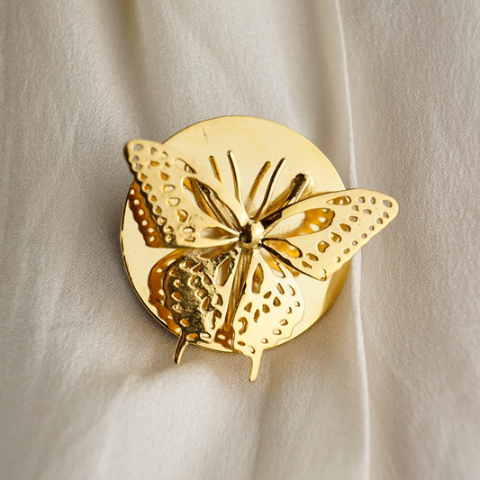 anillo y broche mariposa cola de golondrina