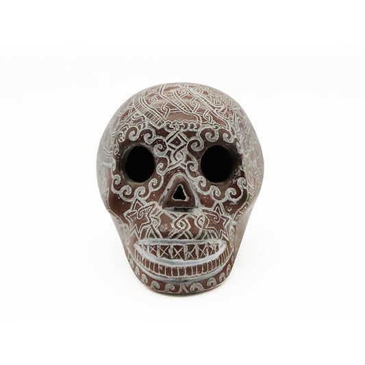 cráneo de barro rojo