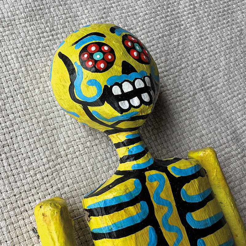 Marioneta esqueleto amarillo
