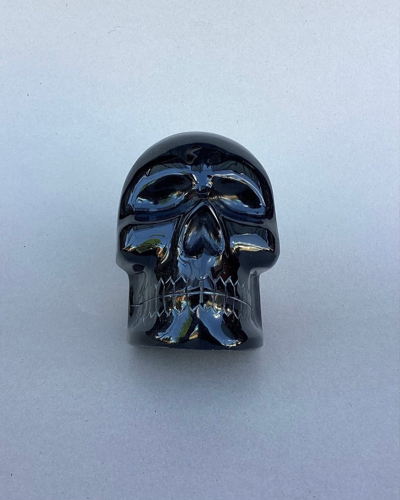 cráneo obsidiana dorada