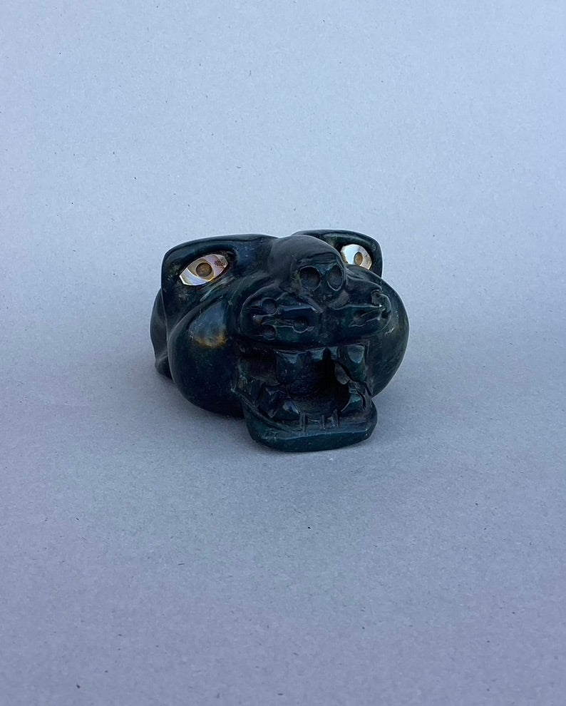 cabeza de jaguar, serpentina