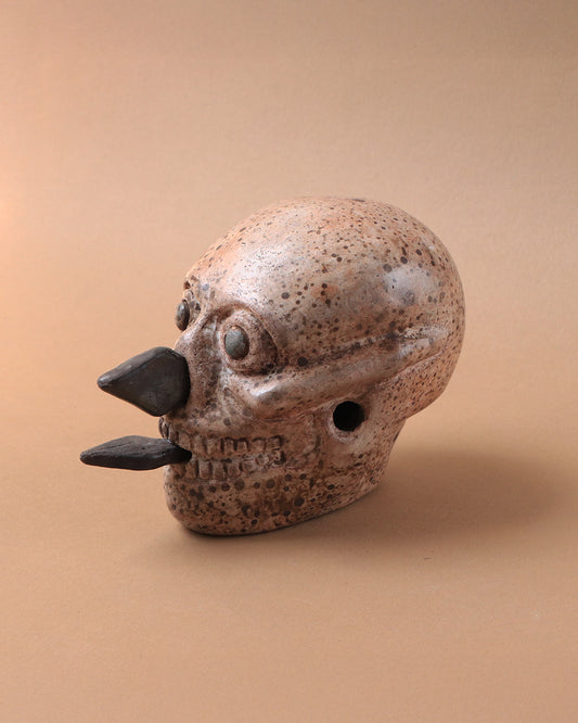 Craneo azteca con cuchillos blanco