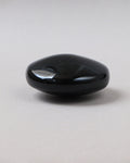 Masajeador de obsidiana luneta
