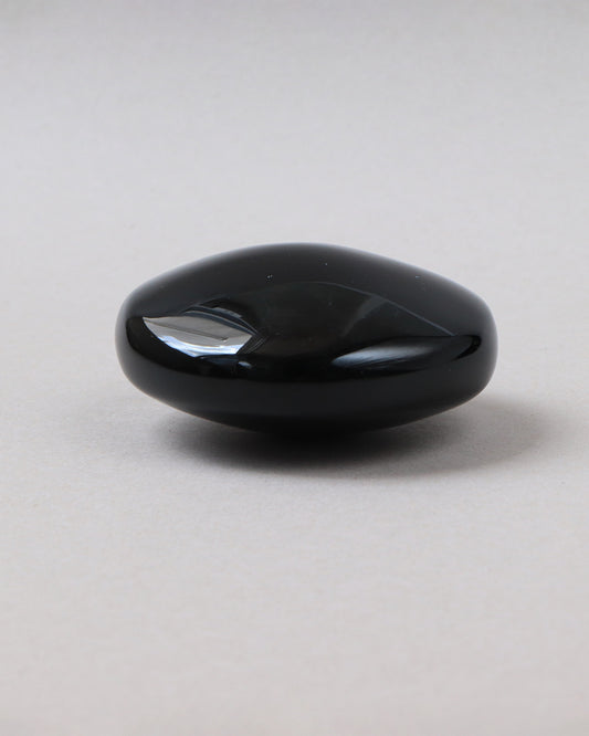 Masajeador de obsidiana luneta