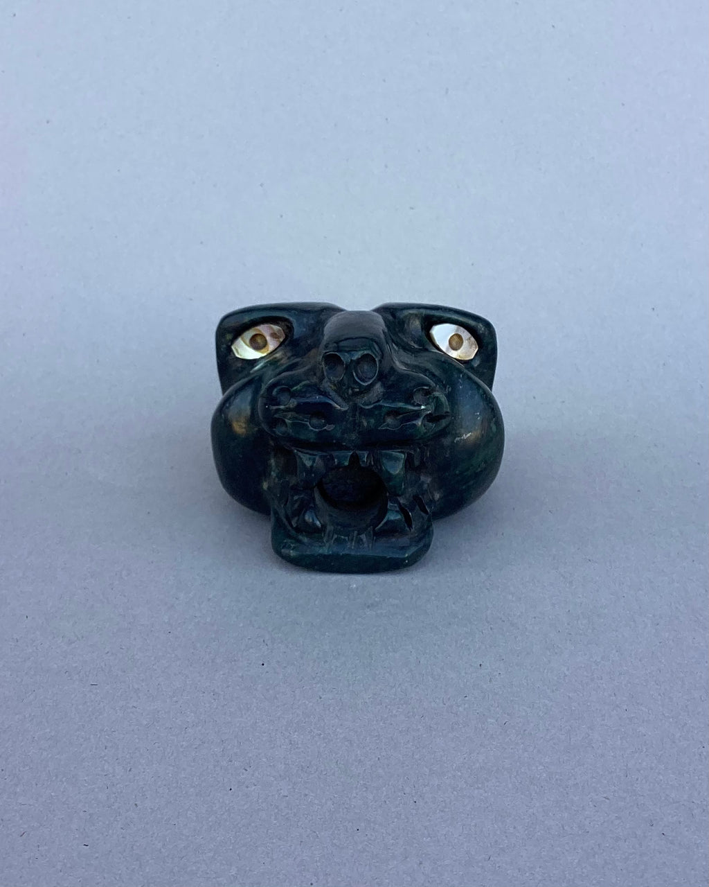 cabeza de jaguar, serpentina
