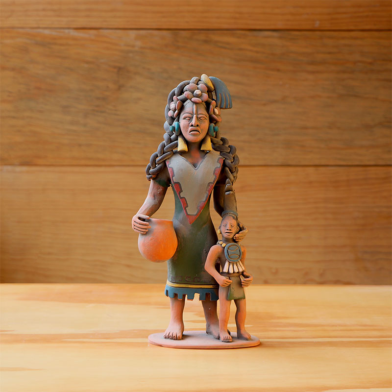 mujer maya con niño