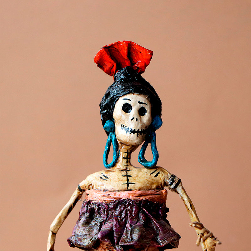 catrina con aretes
