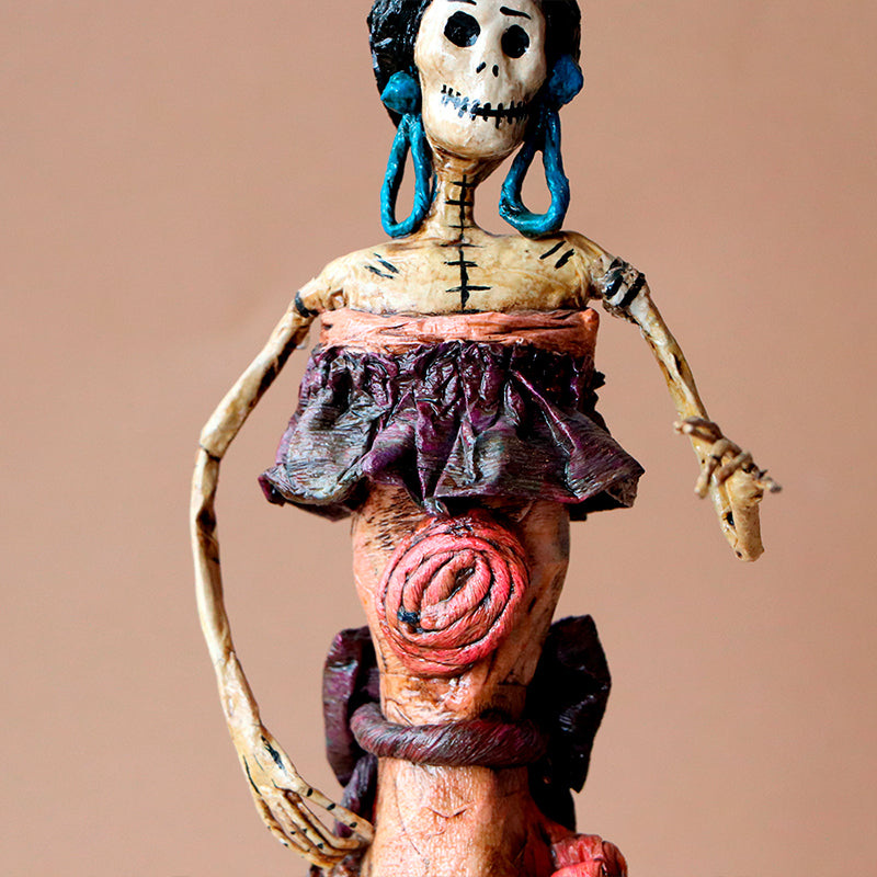catrina con aretes