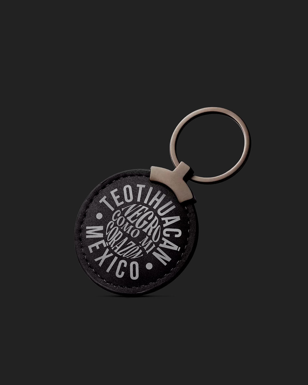 Llavero circular negro Quetzalcóatl