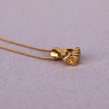 Mute collar power chapa de oro
