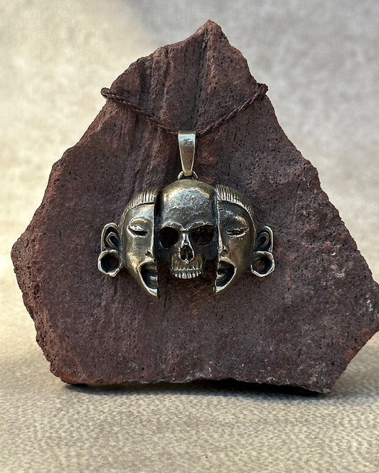 dije máscaras dobles plateado