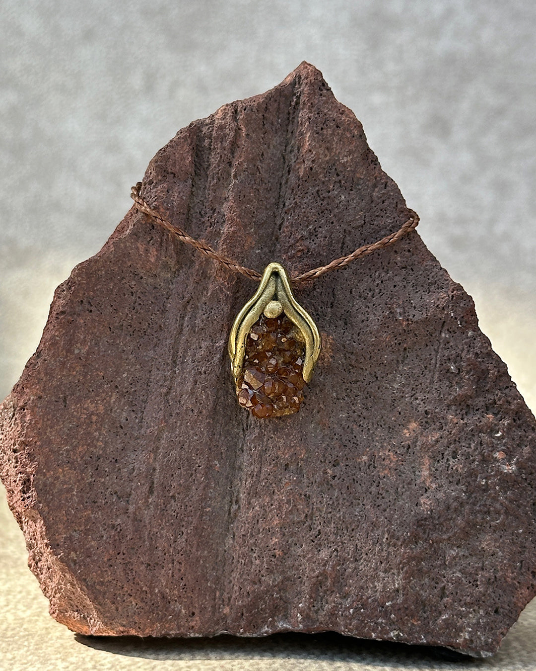 dije capullo granate