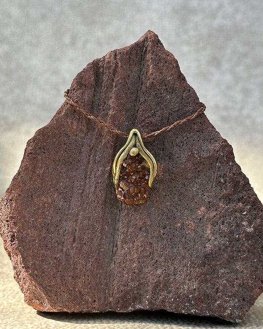 dije capullo granate