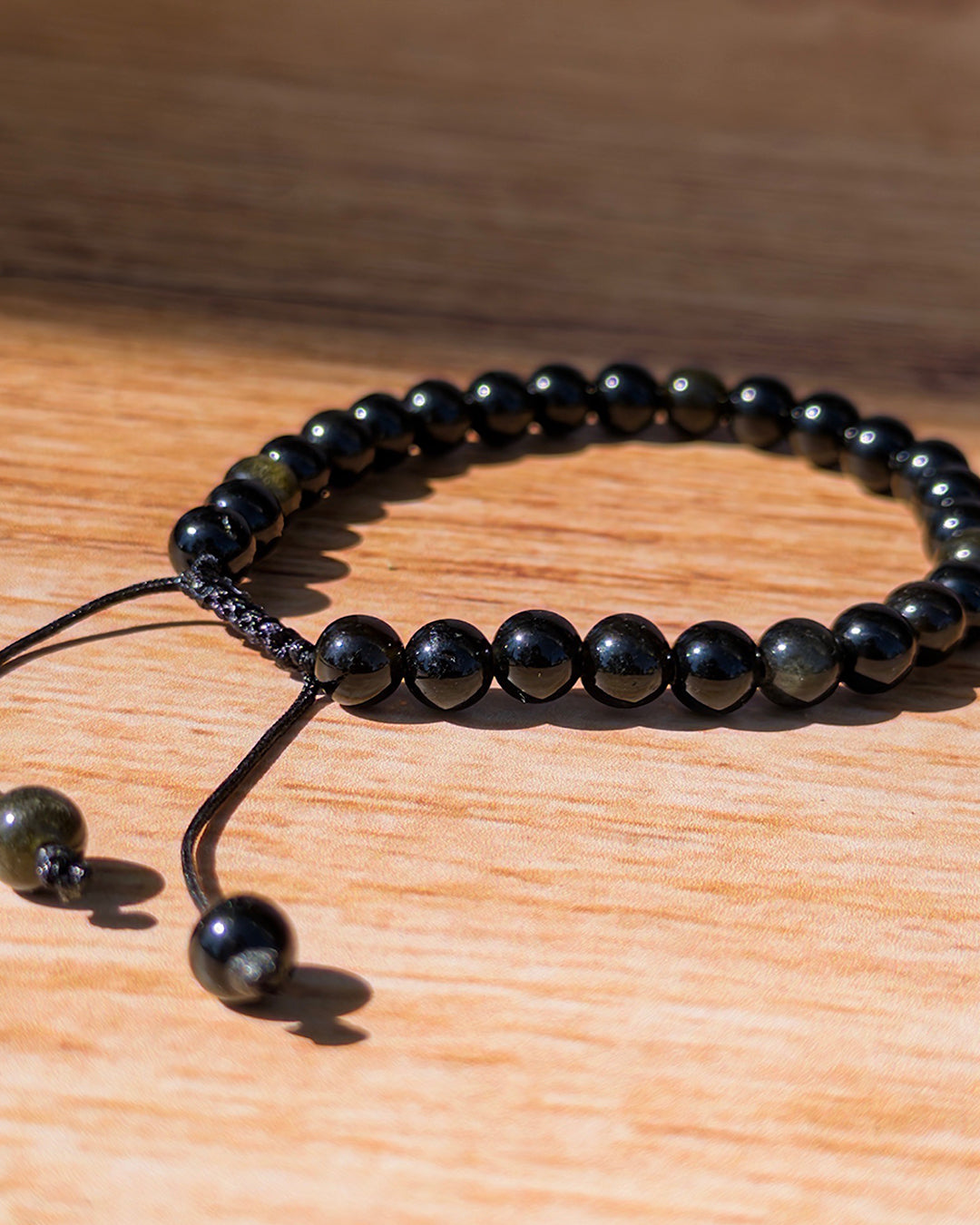 Pulsera ajustable obsidiana dorada 6mm