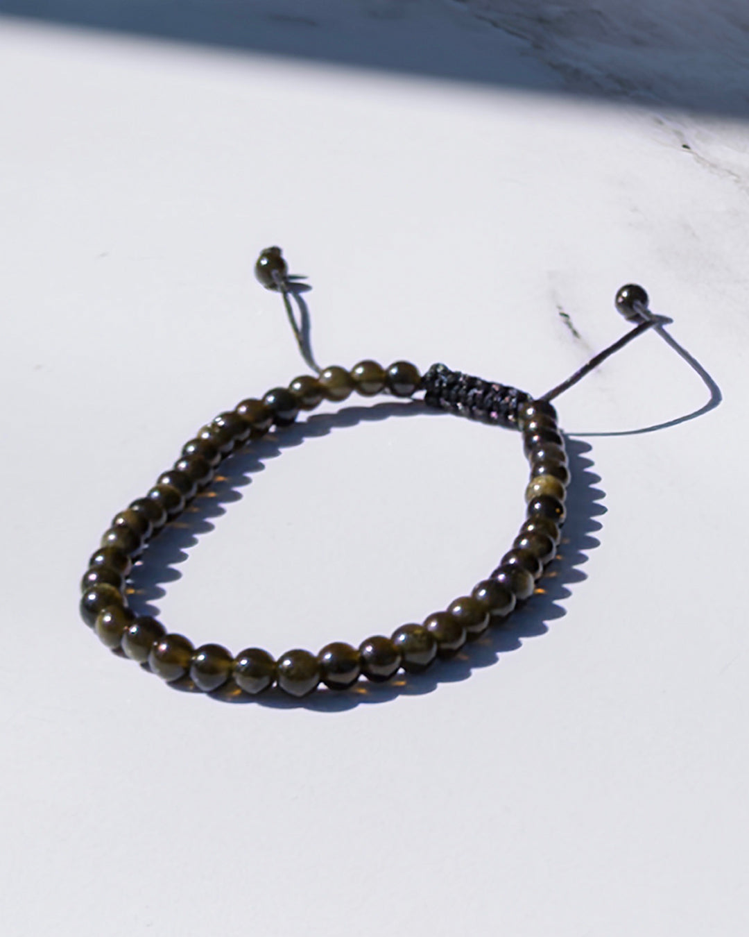 Pulsera ajustable obsidiana dorada 6mm