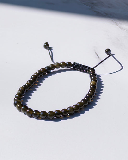 Pulsera ajustable obsidiana dorada 6mm