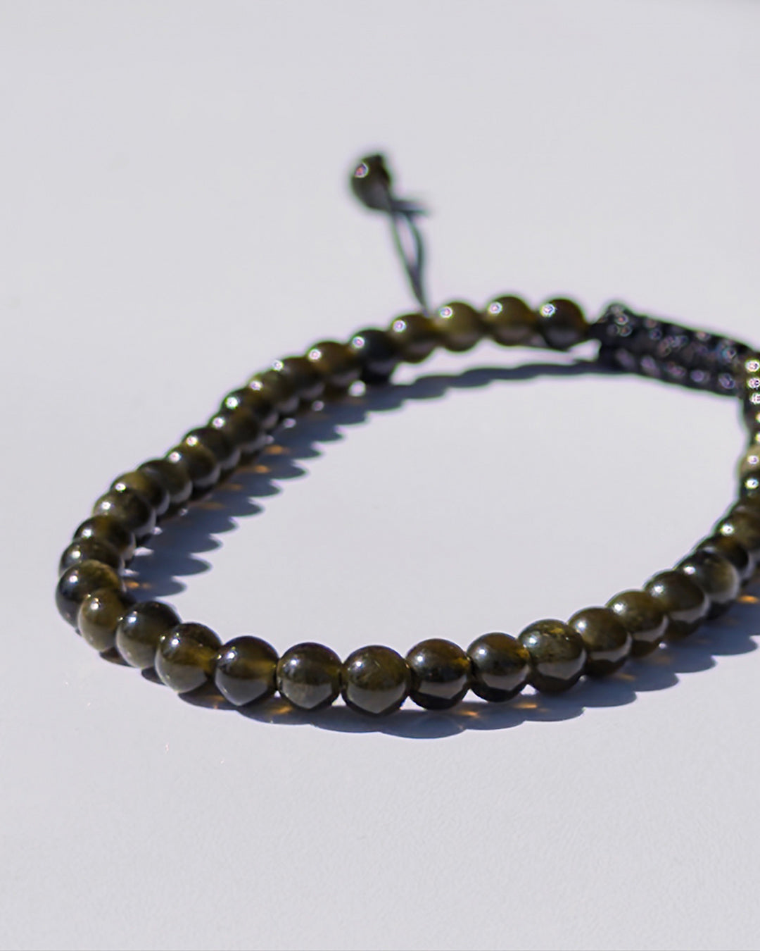 Pulsera ajustable obsidiana dorada 6mm